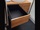 Laquage noir velours à l'intérieur et façades en chêne pour un rendu top et durable