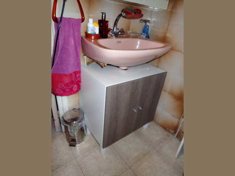 Installation du meuble faite, le style plaît bien mais il y a un problème de rangement.