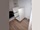 Mise en place du meuble dans la salle de bain, avant la pose du plan