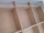 Les courbes hautes pour faire un petit effet déco vis-à-vis de la moulure. Ici, avec le mastic, cachant les jointures de la structure, qui sera poncé avant peinture.