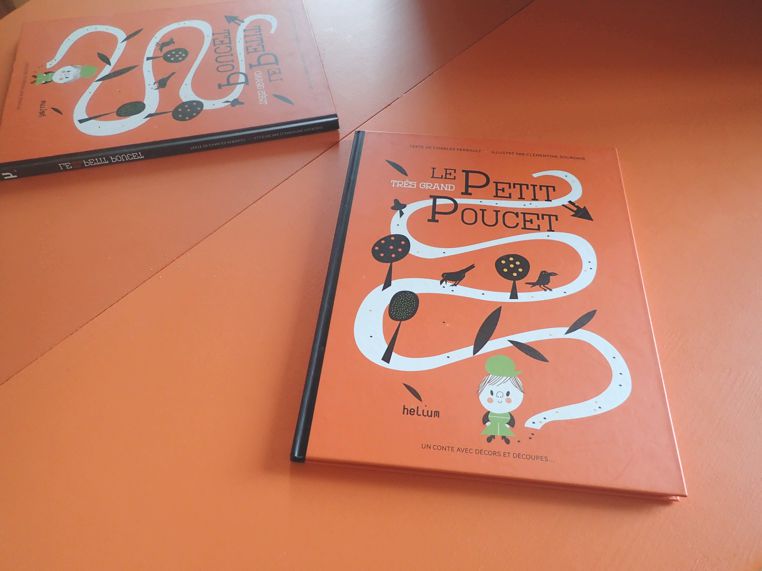 Comme la couleur vitaminée d'ailleurs! Celle-ci vient d'un beau livre fétiche. La finition laquée assure la solidité et un touché ultra-doux et glissant.